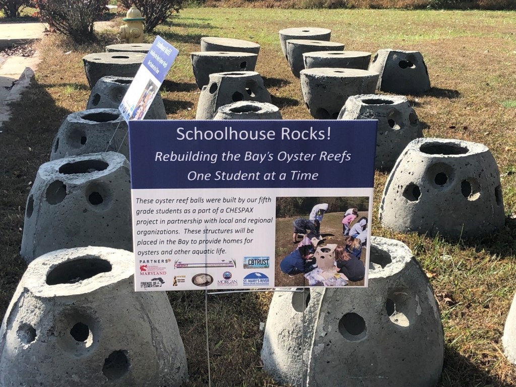 Sign with reef balls.